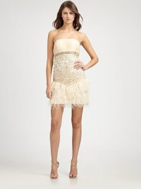 A playful ostrich feather hemline dresses up this intricately beaded design.StraplessRuched bustBeaded bodice with soutache embroideryOstrich feather trimConcealed side zipFully linedAbout 19½ from natural waist70% nylon/30% polyesterSpot cleanImportedModel shown is 5'10½ (179cm) wearing US size 4. A playful ostrich feather hemline dresses up this intricately beaded design.StraplessRuched bustBeaded bodice with soutache embroideryOstrich feather trimConcealed side zipFully linedAbout 19½ from natural waist70% nylon/30% polyesterSpot cleanImportedModel shown is 5'10½ (179cm) wearing US size 4.