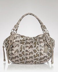Cole Haan's signature satchel gets exotic in python-embossed leather. Pockets and over-the-shoulder ease make this style ideal for the woman with day-to-night demands. Cole Haan's signature satchel gets exotic in python-embossed leather. Pockets and over-the-shoulder ease make this style ideal for the woman with day-to-night demands.