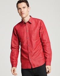 Rendered with just the right amount of color, this casual button-down punches up your everyday wardrobe and is tailored for a slim, modern fit that enhances your look. Rendered with just the right amount of color, this casual button-down punches up your everyday wardrobe and is tailored for a slim, modern fit that enhances your look.