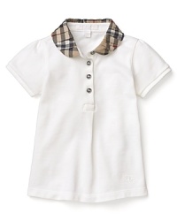 A short sleeve polo with a pleated check collar from Burberry. A short sleeve polo with a pleated check collar from Burberry.
