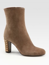 Refined suede design with a metal-studded heel. Self-covered heel with metal studs, 3¼ (80mm)Suede upperSide zipperLeather lining and solePadded insoleMade in Italy Refined suede design with a metal-studded heel. Self-covered heel with metal studs, 3¼ (80mm)Suede upperSide zipperLeather lining and solePadded insoleMade in Italy