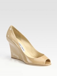 From the 24:7 Collection. Elegant patent leather wedge transitions smoothly from office hours through after hours. Self-covered wedge, 3½ (90mm)Patent leather upperLeather liningBuffed leather solePadded insoleMade in ItalyOUR FIT MODEL RECOMMENDS ordering one half size up as this style runs small. From the 24:7 Collection. Elegant patent leather wedge transitions smoothly from office hours through after hours. Self-covered wedge, 3½ (90mm)Patent leather upperLeather liningBuffed leather solePadded insoleMade in ItalyOUR FIT MODEL RECOMMENDS ordering one half size up as this style runs small.