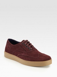 Classic wingtip styling and composition finished in supremely soft suede, shapes and defines this lace-up design with a contrasting rubber sole that exudes a downtown-cool look.Suede upperLeather liningPadded insoleRubber soleImported Classic wingtip styling and composition finished in supremely soft suede, shapes and defines this lace-up design with a contrasting rubber sole that exudes a downtown-cool look.Suede upperLeather liningPadded insoleRubber soleImported