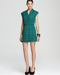 Striking ikat print makes a standout statement on this Aqua mini dress, rendered in a wrap-style, pullover silhouette. Heighten the accents in the piece by complementing it with polished pumps. Striking ikat print makes a standout statement on this Aqua mini dress, rendered in a wrap-style, pullover silhouette. Heighten the accents in the piece by complementing it with polished pumps.