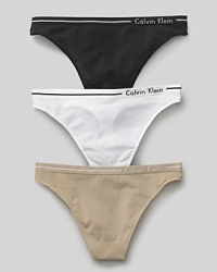 Calvin Klein Underwear seamless thong. A comfortable seamless thong with logo and stripe detail on waistband. Cotton gusset. Style #D2220 Calvin Klein Underwear seamless thong. A comfortable seamless thong with logo and stripe detail on waistband. Cotton gusset. Style #D2220