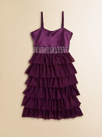 Mod, ruffled peplum is complimented by a sequined waistband on this shimmery, party-ready frock.Slightly curved necklineSpaghetti strapsPullover styleSequined waistbandRuffled peplum85% rayon/15% spandexHand washImported Mod, ruffled peplum is complimented by a sequined waistband on this shimmery, party-ready frock.Slightly curved necklineSpaghetti strapsPullover styleSequined waistbandRuffled peplum85% rayon/15% spandexHand washImported