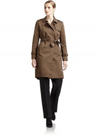 THE LOOKTopstitched spread collarConcealed button frontShoulder epaulettesSingle gun flapLong sleeves with belted cuffsWide buckle beltSide besom pocketsBack storm shieldCenter back pleat at hemTHE FITAbout 38 from shoulder to hemTHE MATERIALShell: 65% polyester/35% cottonFill: polyesterFully linedCARE & ORIGINMachine washMade in ItalyModel shown is 5'10 (177cm) wearing US size 4. THE LOOKTopstitched spread collarConcealed button frontShoulder epaulettesSingle gun flapLong sleeves with belted cuffsWide buckle beltSide besom pocketsBack storm shieldCenter back pleat at hemTHE FITAbout 38 from shoulder to hemTHE MATERIALShell: 65% polyester/35% cottonFill: polyesterFully linedCARE & ORIGINMachine washMade in ItalyModel shown is 5'10 (177cm) wearing US size 4.