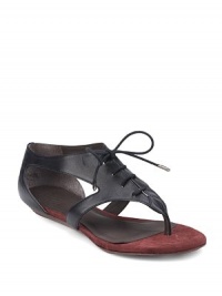 THE LOOKThong sandal Oxford-style lace-up frontTHE FITStacked wedge heel, ½ (15mm)THE MATERIALLeather upper Leather lining and sole Padded insoleORIGINImportedOUR FIT MODEL RECOMMENDS ordering one half size up as this style runs small. THE LOOKThong sandal Oxford-style lace-up frontTHE FITStacked wedge heel, ½ (15mm)THE MATERIALLeather upper Leather lining and sole Padded insoleORIGINImportedOUR FIT MODEL RECOMMENDS ordering one half size up as this style runs small.