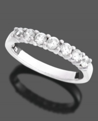 Add a little extra sparkle to your special occasion. This beautifully crafted anniversary band features seven, round-cut diamonds (3/4 ct t.w.) in a polished 14k white gold setting. Add a little extra sparkle to your special occasion. This beautifully crafted anniversary band features seven, round-cut diamonds (3/4 ct t.w.) in a polished 14k white gold setting.