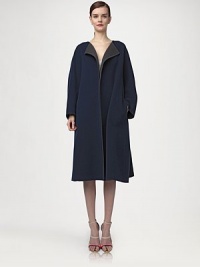 This chic, minimal wool style is lined with a contrasting, complementary color.CollarlessOpen frontLong sleevesSide slash pocketsWoolDry cleanMade in ItalyModel shown is 5'11 (180cm) wearing US size 4. This chic, minimal wool style is lined with a contrasting, complementary color.CollarlessOpen frontLong sleevesSide slash pocketsWoolDry cleanMade in ItalyModel shown is 5'11 (180cm) wearing US size 4.