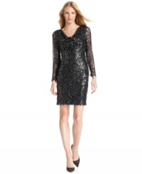 Calvin Klein's shimmering cowlneck dress is ready for the spotlight at your next soiree with a generous dose of shiny paillettes. Calvin Klein's shimmering cowlneck dress is ready for the spotlight at your next soiree with a generous dose of shiny paillettes.