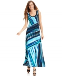 Calvin Klein's printed maxi dress is radiant with a striking stripe motif and relaxed fit.