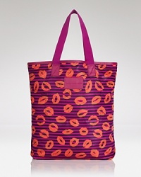 Lighten your load with this nylon MARC BY MARC JACOBS tote, which features durable leather trims and a fresh-for-the-season print. Lighten your load with this nylon MARC BY MARC JACOBS tote, which features durable leather trims and a fresh-for-the-season print.
