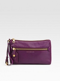 This day-to-night design in supple leather is simple, yet chic.Adjustable wrist strap, 3- 8 dropTop zip closureOne outside zip pocketOne inside zip pocketTwo inside open pocketsFully lined11¼W X 6½H X 1¾DImported This day-to-night design in supple leather is simple, yet chic.Adjustable wrist strap, 3- 8 dropTop zip closureOne outside zip pocketOne inside zip pocketTwo inside open pocketsFully lined11¼W X 6½H X 1¾DImported