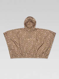 A waterproof nylon, hooded poncho with front pocket and side snaps is adorned with Gucci zoo print and signature web detail.Attached hoodPoncho sleevesHalf-zip frontCenter flap pocketSnap sidesPolyamideMachine washImported A waterproof nylon, hooded poncho with front pocket and side snaps is adorned with Gucci zoo print and signature web detail.Attached hoodPoncho sleevesHalf-zip frontCenter flap pocketSnap sidesPolyamideMachine washImported