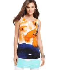 A painterly print on Alfani's petite tunic adds a splash of color to your outfit and looks runway-ready with a chic gathered neck and decorative tie detail. A painterly print on Alfani's petite tunic adds a splash of color to your outfit and looks runway-ready with a chic gathered neck and decorative tie detail.