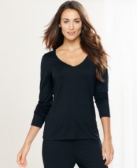 Lounge around in the easy comfort of Alfani's Essential long-sleeve tee. It features a v-neck with satin trim around the neckline. Lounge around in the easy comfort of Alfani's Essential long-sleeve tee. It features a v-neck with satin trim around the neckline.