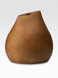 An organic statement of handcrafted style, carved from a single piece of sustainable mango wood by skilled artisans in Thailand. Decorative piece; not intended for water10 highMango woodWipe cleanHandcrafted in Thailand An organic statement of handcrafted style, carved from a single piece of sustainable mango wood by skilled artisans in Thailand. Decorative piece; not intended for water10 highMango woodWipe cleanHandcrafted in Thailand