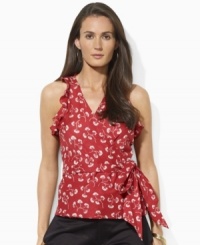 Lauren by Ralph Lauren's flirty wrap silhouette exudes undeniable femininity in a sleeveless blouse, accented with a vibrant print and ruffled sleeves for a charming summer look. Lauren by Ralph Lauren's flirty wrap silhouette exudes undeniable femininity in a sleeveless blouse, accented with a vibrant print and ruffled sleeves for a charming summer look.