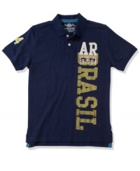 This football-inspired polo shirt from American Rag refreshes a traditional look with a little South American style. This football-inspired polo shirt from American Rag refreshes a traditional look with a little South American style.