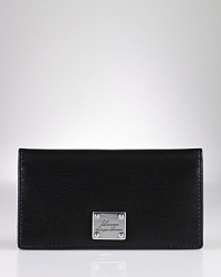 Richly crafted, Lauren Ralph Lauren's leather wallet features a slim, sophisticated silhouette to effortlessly store belongings. Richly crafted, Lauren Ralph Lauren's leather wallet features a slim, sophisticated silhouette to effortlessly store belongings.