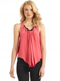 THE LOOKPleated v-neckline with dramatically contrasting trimSleevelessRacerback with matching trim and delicate gathered pleatingFigure-flattering v-hemlineTHE FITAbout 28 from shoulder to hemTHE MATERIALSilkCARE & ORIGINDry cleanImported THE LOOKPleated v-neckline with dramatically contrasting trimSleevelessRacerback with matching trim and delicate gathered pleatingFigure-flattering v-hemlineTHE FITAbout 28 from shoulder to hemTHE MATERIALSilkCARE & ORIGINDry cleanImported