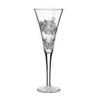 Waterford Snowflake Wishes, a new series of collectible giftware, celebrates nature's most beautiful and amazing feat of engineering -- the snowflake -- in a delightful 10 year series. This premier edition, Wishes for Joy, features fanciful snowflakes on a champagne flute in the style of Waterford's most beloved pattern, Lismore.