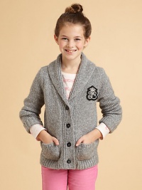 This classic cardigan, updated with a sprinkling of sequins and a whimsical rhinestone crest on the chest, offers a twinkling take off on preppy-dom.Shawl collarButton frontChest crestLong sleeeves with ribbed cuffsPatch pocketsPolyester/acrylic/nylon/woolDry cleanImported Please note: Number of buttons may vary depending on size ordered. This classic cardigan, updated with a sprinkling of sequins and a whimsical rhinestone crest on the chest, offers a twinkling take off on preppy-dom.Shawl collarButton frontChest crestLong sleeeves with ribbed cuffsPatch pocketsPolyester/acrylic/nylon/woolDry cleanImported Please note: Number of buttons may vary depending on size ordered.