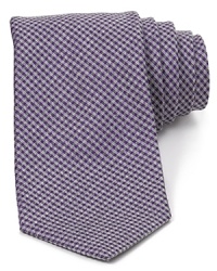 A vintage-inspired mini-check pattern gets the modern treatment with a dapper skinny-tie silhouette. A vintage-inspired mini-check pattern gets the modern treatment with a dapper skinny-tie silhouette.