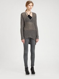 Woven from the finest alpaca and silk, this open-knit sweater is reinvented by dropped shoulders and an asymmetrical hi-lo hem. V-neckDropped shouldersLong sleevesAsymmetrical hi-lo hem75% alpaca/25% silkDry cleanImported of Italian fabricModel shown is 5'10 (177cm) wearing US size Small. Woven from the finest alpaca and silk, this open-knit sweater is reinvented by dropped shoulders and an asymmetrical hi-lo hem. V-neckDropped shouldersLong sleevesAsymmetrical hi-lo hem75% alpaca/25% silkDry cleanImported of Italian fabricModel shown is 5'10 (177cm) wearing US size Small.