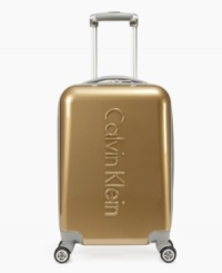 The bright way to travel! A standout metallic sheen catches the eye at the airport or en route, making a style statement and an easy exit from any busy terminal. Built tough and durable, this hardside has 360º easy-glide mobility that follows your lead wherever you go, plus a fully-lined interior with mesh pocket and tie down straps for an incredibly clean and organized landing. 10-year warranty. The bright way to travel! A standout metallic sheen catches the eye at the airport or en route, making a style statement and an easy exit from any busy terminal. Built tough and durable, this hardside has 360º easy-glide mobility that follows your lead wherever you go, plus a fully-lined interior with mesh pocket and tie down straps for an incredibly clean and organized landing. 10-year warranty.