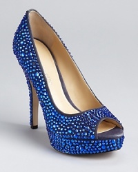 Encrusted in sparkling crystals, these Enzo Angiolini pumps make a dazzling appearance at the most glamourous of soirées. Encrusted in sparkling crystals, these Enzo Angiolini pumps make a dazzling appearance at the most glamourous of soirées.