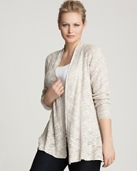 An airy pointelle knit fashions the flared shape of this essential Eileen Fisher cardigan, styled in a longer length with an open front for maximum layering options. An airy pointelle knit fashions the flared shape of this essential Eileen Fisher cardigan, styled in a longer length with an open front for maximum layering options.
