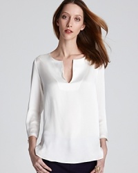 Pure silk lends poetic dimension to a Bloomingdale's Exclusive Gerard Darel blouse. Keep the look beautifully understated and focus on the flawless silhouette. Pure silk lends poetic dimension to a Bloomingdale's Exclusive Gerard Darel blouse. Keep the look beautifully understated and focus on the flawless silhouette.