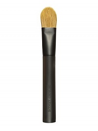 Professional expert shaping brush developed to optimize application of designer shaping and firming cream foundation SPF 20. Brush shape is large with a sharper end to allow for precise application of foundation onto delicate fine lines and contouring. Contains a blend of marten hair and synthetic fibers developed specifically for rich, creamy foundation formulas. Application is precise and seamless. 