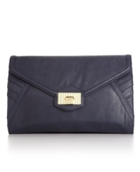 A modern style with sophisticated detail, it won't be hard to impress with this gorgeous Danielle Nicole oversized clutch. Chic side stitching and a textured goldtone plaque give this understated bag a perfectly polished finish. A modern style with sophisticated detail, it won't be hard to impress with this gorgeous Danielle Nicole oversized clutch. Chic side stitching and a textured goldtone plaque give this understated bag a perfectly polished finish.