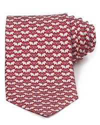 A parade of elephants are linked together by Salvatore Ferragamo's signature logos on this exceptional tie, rendered in plush Italian silk for a soft hand and luxurious refinement. A parade of elephants are linked together by Salvatore Ferragamo's signature logos on this exceptional tie, rendered in plush Italian silk for a soft hand and luxurious refinement.