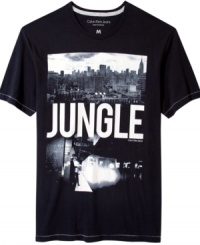 Essential gear for life in the urban jungle: Calvin Klein Jeans' graphic tee printed with a cityscape and subway scene. Essential gear for life in the urban jungle: Calvin Klein Jeans' graphic tee printed with a cityscape and subway scene.