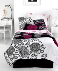 Black, white and pink allover! A classic design gets a new look in this Silver Medallion comforter set, featuring a black medallion and flourish print on a crisp white ground. Pops of hot pink and silver give this set a modern makeover.