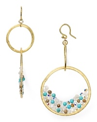 Turquoise stones and striking crystals take these hoop earrings from Chan Luu from simple to stunning. Like her signature wrap bracelets, this pair lends an effortless dose of eclectic beauty. Turquoise stones and striking crystals take these hoop earrings from Chan Luu from simple to stunning. Like her signature wrap bracelets, this pair lends an effortless dose of eclectic beauty.