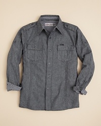 An earthy button down with pronounced tonal topstitching and cool details like shoulder epaulettes and check lining. An earthy button down with pronounced tonal topstitching and cool details like shoulder epaulettes and check lining.