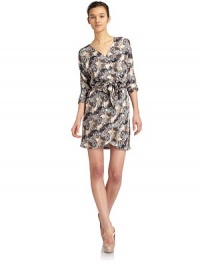 THE LOOKAllover abstract print with beaded embellishmentThree-quarter length sleevesWrap front with hook-and-bar and button closureBanded waist with self beltTHE FITAbout 34 from shoulder to hemTHE MATERIALSilkFully linedCARE & ORIGINDry cleanImportedModel shown is 5'10 (177cm) wearing US size 4. THE LOOKAllover abstract print with beaded embellishmentThree-quarter length sleevesWrap front with hook-and-bar and button closureBanded waist with self beltTHE FITAbout 34 from shoulder to hemTHE MATERIALSilkFully linedCARE & ORIGINDry cleanImportedModel shown is 5'10 (177cm) wearing US size 4.