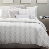 Like a festooned curtain that unfolds to soft sheets of shimmering motifs, Curtain Call sets the stage for the bed of your dreams with its multi-tones of fresh blue and white. Embroidered and quilted pillows are the supporting cast for this melodic ensemble.