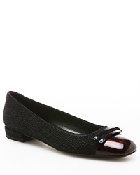 Stuart Weitzman finishes off your favorite ballet flat style with on-trend cap toes, in a something-new, squared-off shape. Stuart Weitzman finishes off your favorite ballet flat style with on-trend cap toes, in a something-new, squared-off shape.