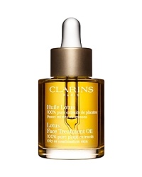 Natural astringent for Oily or Combination Skin. 100% pure plant extracts. Zero preservatives. Clarins exclusive blend of Rosewood, Geranium and Lotus extracts purifies, tightens pores and refines the skin texture. Hazelnut Oil softens, soothes and seals in moisture to prevent fine lines. Non-staining. In the evening, after thorough cleansing and toning, apply a small amount to face and neck still damp with Toning Lotion, avoiding the eye contour. Gently dab face with a soft tissue to remove any excess product. Natural astringent for Oily or Combination Skin. 100% pure plant extracts. Zero preservatives. Clarins exclusive blend of Rosewood, Geranium and Lotus extracts purifies, tightens pores and refines the skin texture. Hazelnut Oil softens, soothes and seals in moisture to prevent fine lines. Non-staining. In the evening, after thorough cleansing and toning, apply a small amount to face and neck still damp with Toning Lotion, avoiding the eye contour. Gently dab face with a soft tissue to remove any excess product.