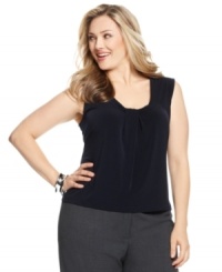 This plus size top is an essential made extra stylish with a twisted scoop neckline, ready to pair with your other style staples! By Calvin Klein. This plus size top is an essential made extra stylish with a twisted scoop neckline, ready to pair with your other style staples! By Calvin Klein.