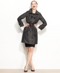 Take a walk on the wild side in Calvin Klein's weather-resistant trench coat. The double-breasted styling and chic animal print give this classic a new twist. Take a walk on the wild side in Calvin Klein's weather-resistant trench coat. The double-breasted styling and chic animal print give this classic a new twist.