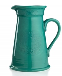 Homegrown style. An organic shape and engraved florals give the Espana Antica pitcher a handcrafted feel that suits country settings. With a glossy teal finish. From the Tabletops Unlimited dinnerware collection. Homegrown style. An organic shape and engraved florals give the Espana Antica pitcher a handcrafted feel that suits country settings. With a glossy teal finish. From the Tabletops Unlimited dinnerware collection.