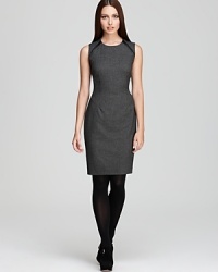Faux-leather embellishment injects a classic Calvin Klein sheath dress with sophisticated edge. Elevate the silhouette with sheer tights and sleek heels for a thoroughly modern look. Faux-leather embellishment injects a classic Calvin Klein sheath dress with sophisticated edge. Elevate the silhouette with sheer tights and sleek heels for a thoroughly modern look.