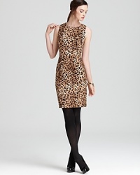 Exotics goes executive as crisp cheetah print enlivens a classic Calvin Klein sheath dress. Exotics goes executive as crisp cheetah print enlivens a classic Calvin Klein sheath dress.